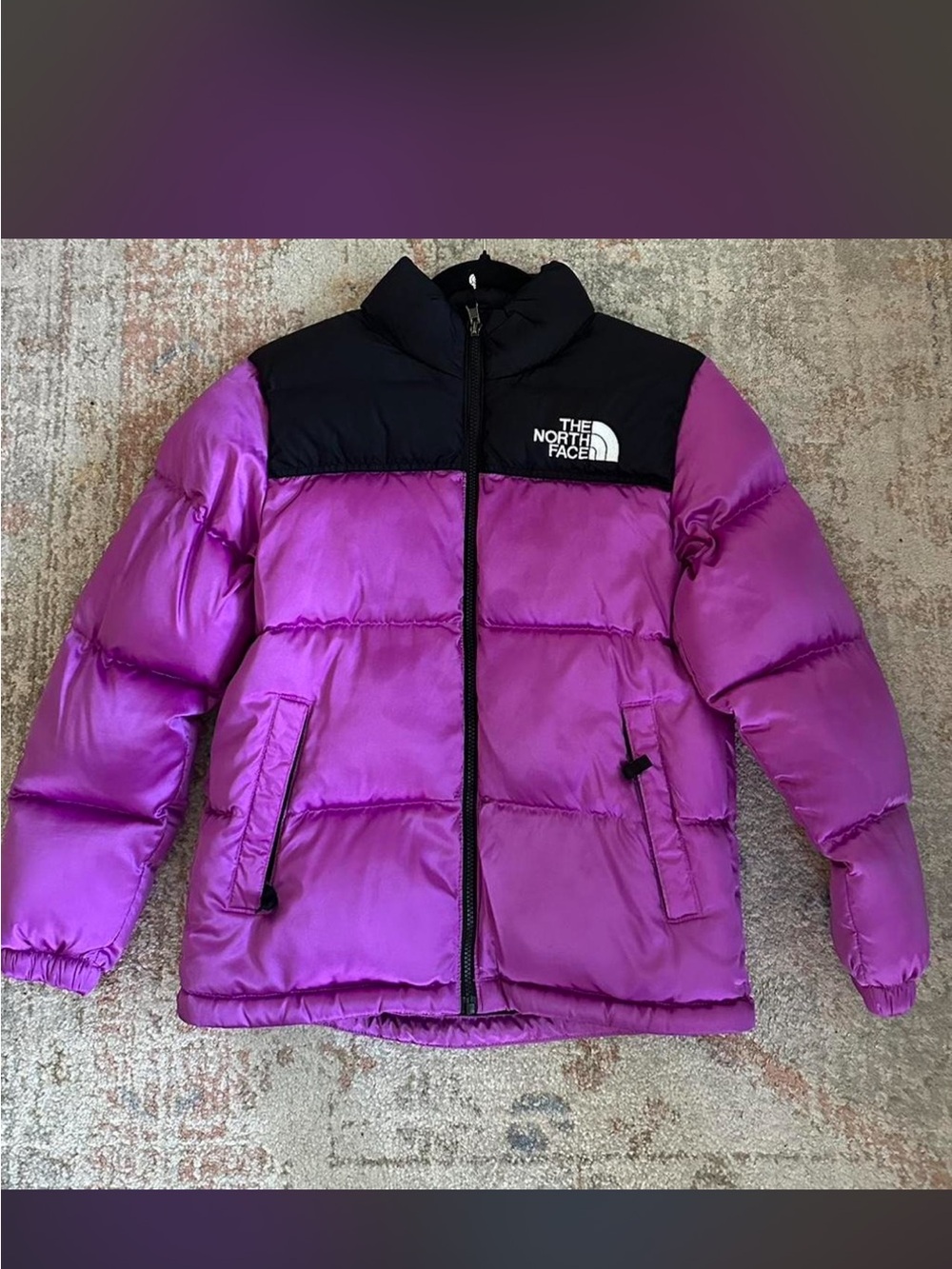 The North Face girls purple puffer jacket